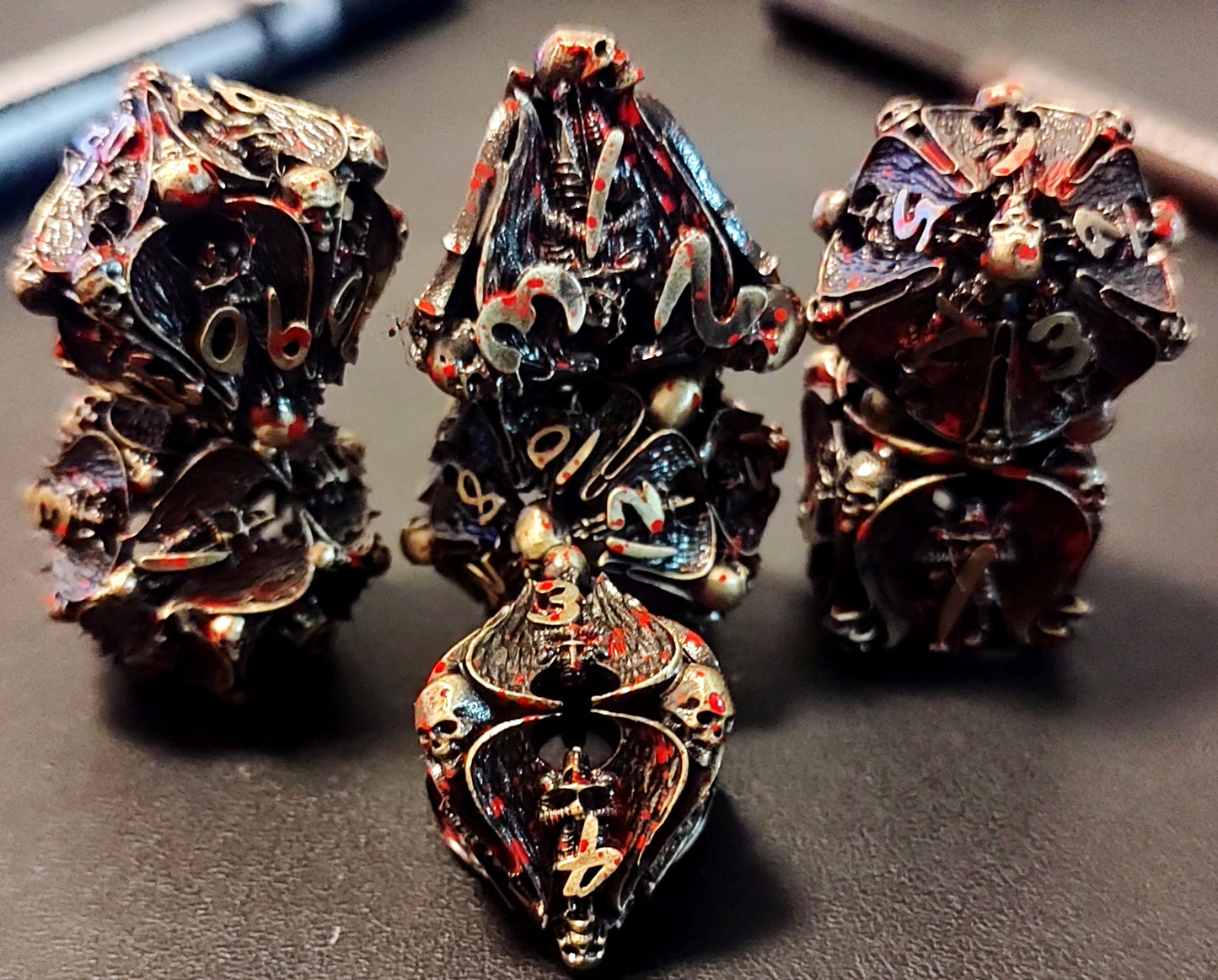 Hollow Metal D&D dice set, blooding Angel design