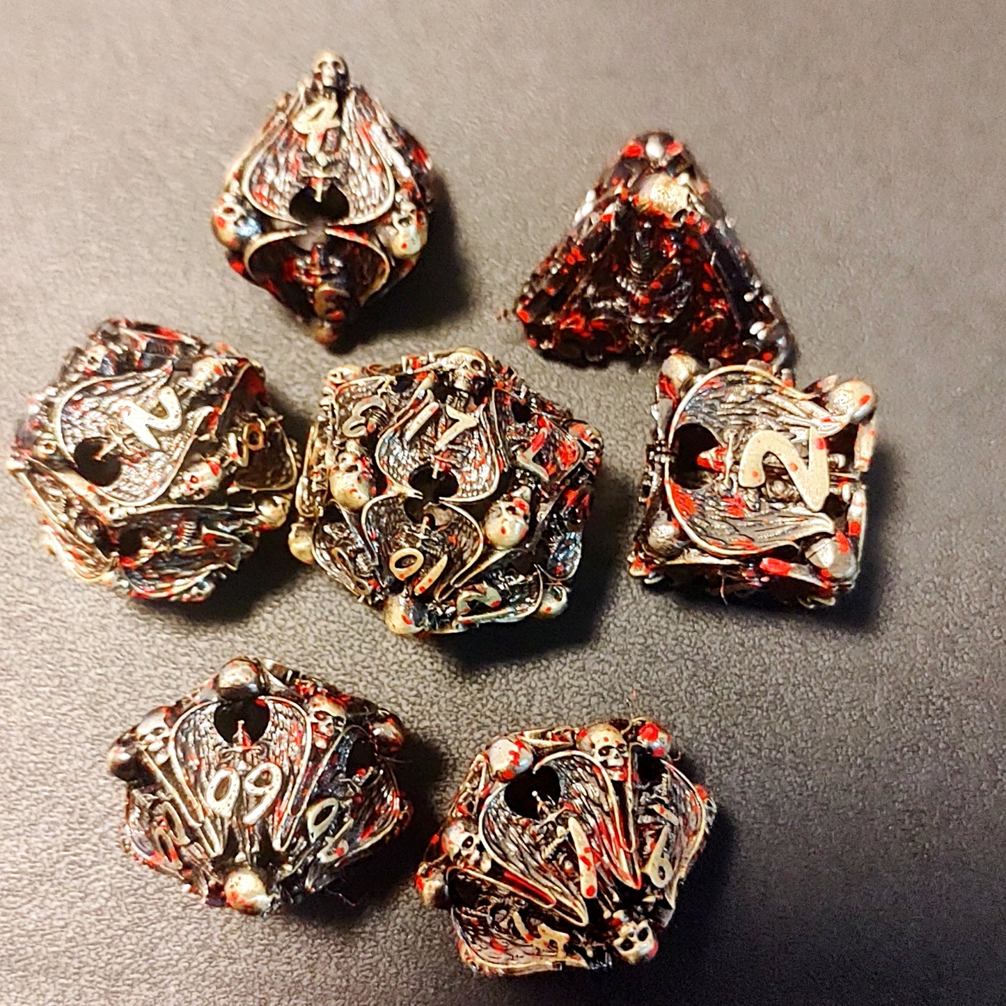 Hollow Metal D&D dice set, blooding Angel design